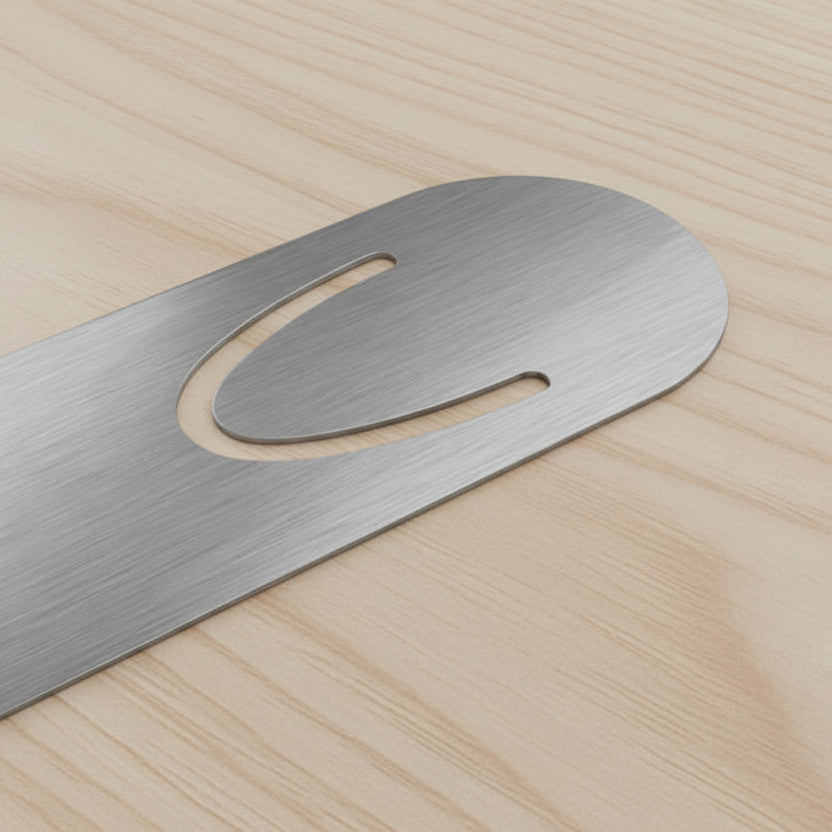 The Magic of Books Metal Bookmark