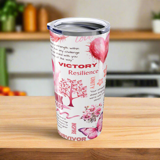 Tumbler with pink floral design and motivational text on a white background
