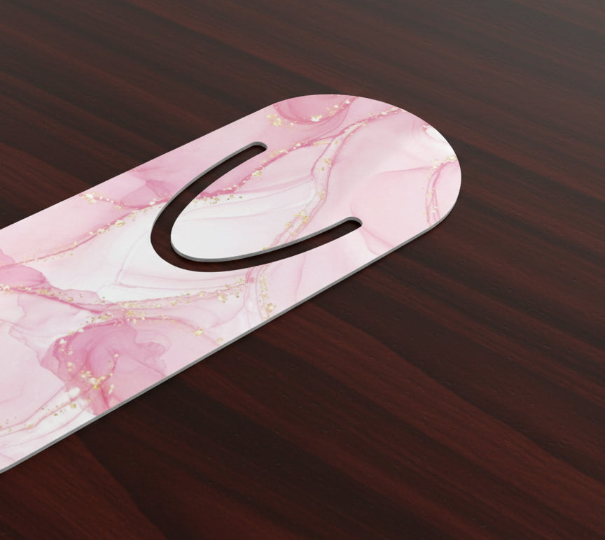 Pink marble patterned product on a wooden surface