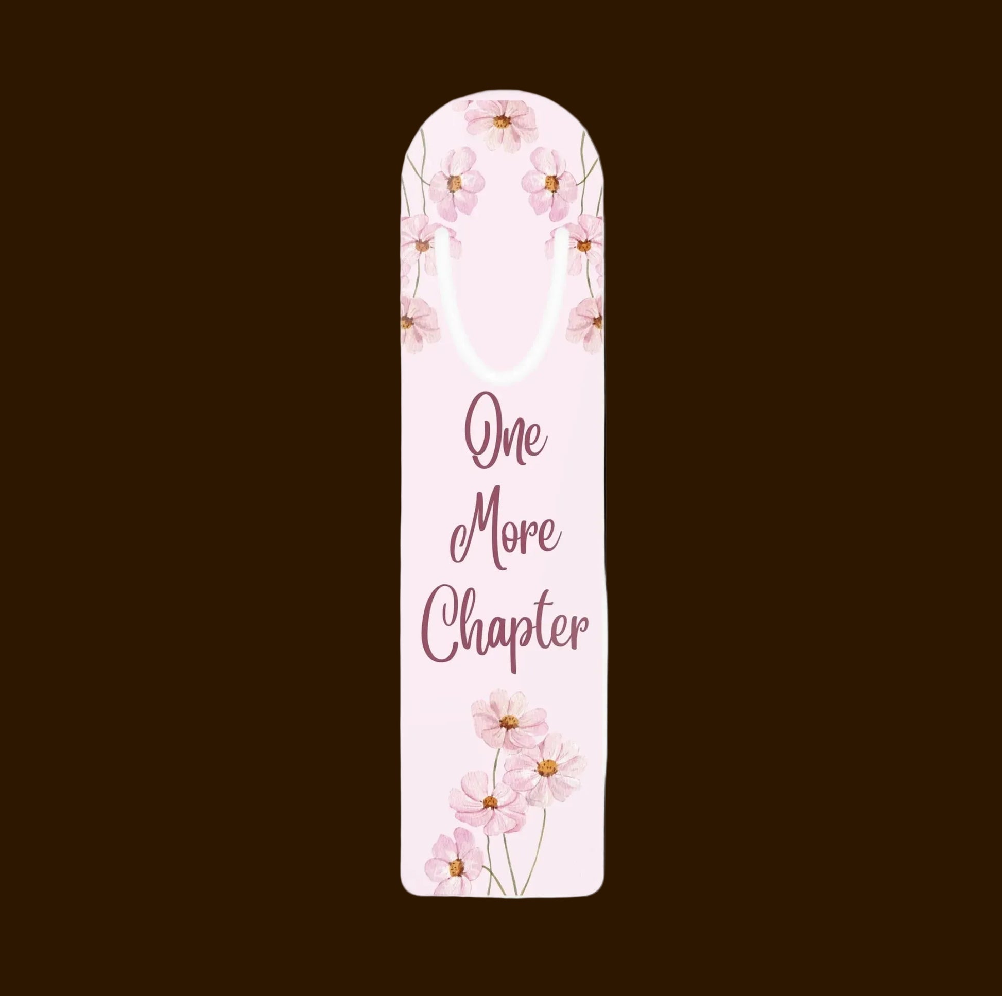 Floral aluminum bookmark with pink flowers and the phrase One More Chapter