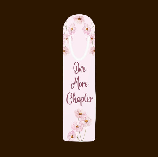 Floral aluminum bookmark with pink flowers and the phrase One More Chapter