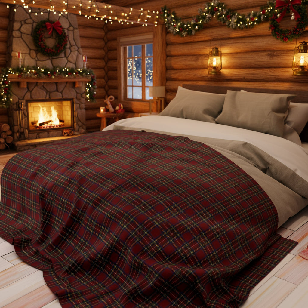 Red plaid blanket on a bed in a bright Christmas bedroom with natural light.