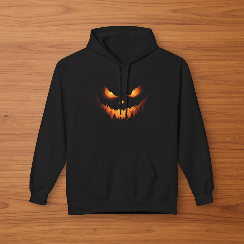 Medium weight black hoodie featuring a glowing scary pumpkin face
